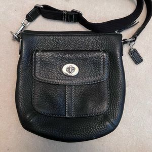 Excellent condition Coach pebble leather crossbody round bag